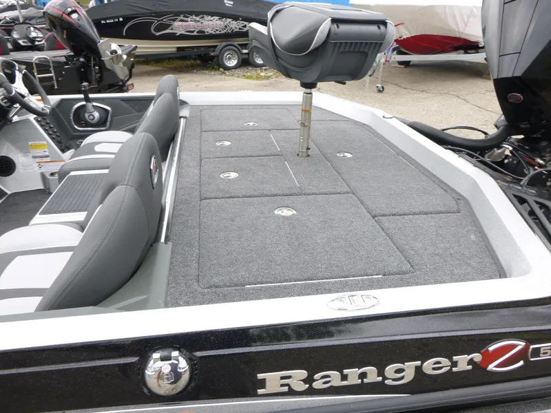 Slide: The Image of 2024 Ranger Z519 Ranger Cup Equipped boat with spacious deck and seating. - 9