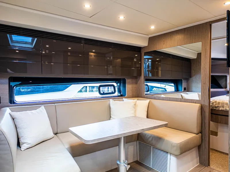 Slide: The Image of Luxurious interior of 2020 Azimut Atlantis 45 yacht with modern seating and windows. - 16