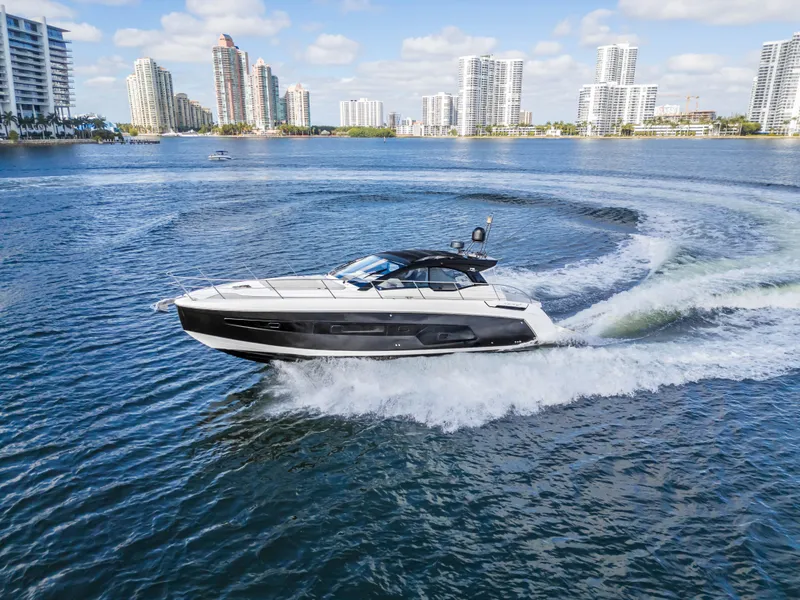 Slide: The Image of Azimut Atlantis 45 yacht cruising in a city harbor, 2020 model. - 2