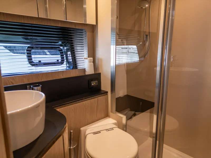 Slide: The Image of Luxurious bathroom in 2020 Azimut Atlantis 45 yacht with modern fixtures and shower. - 26