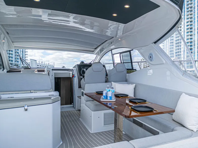 Slide: The Image of Luxurious interior of 2020 Azimut Atlantis 45 yacht with elegant seating and dining area. - 30