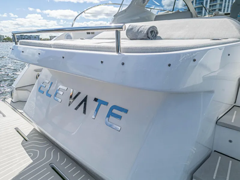 Slide: The Image of Azimut Atlantis 45 yacht, 2020 model, with "Elevate" branding on the stern. - 37