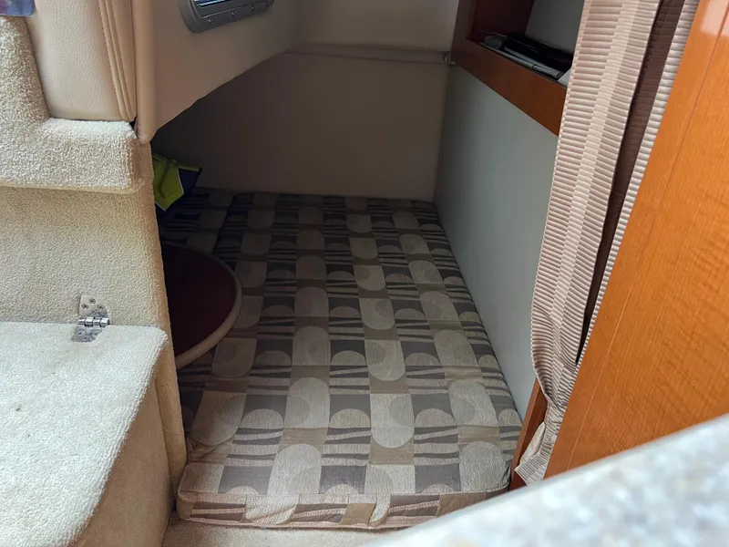 Slide: The Image of Interior cabin of 2007 Chaparral Signature 250 with patterned flooring. - 13