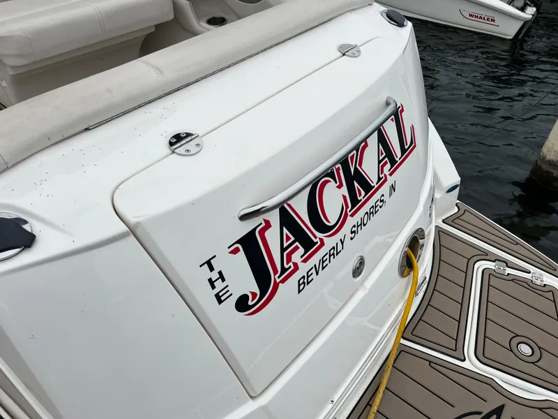 Slide: The Image of 2007 Chaparral Signature 250 boat named "The Jackal" docked at Beverly Shores. - 17