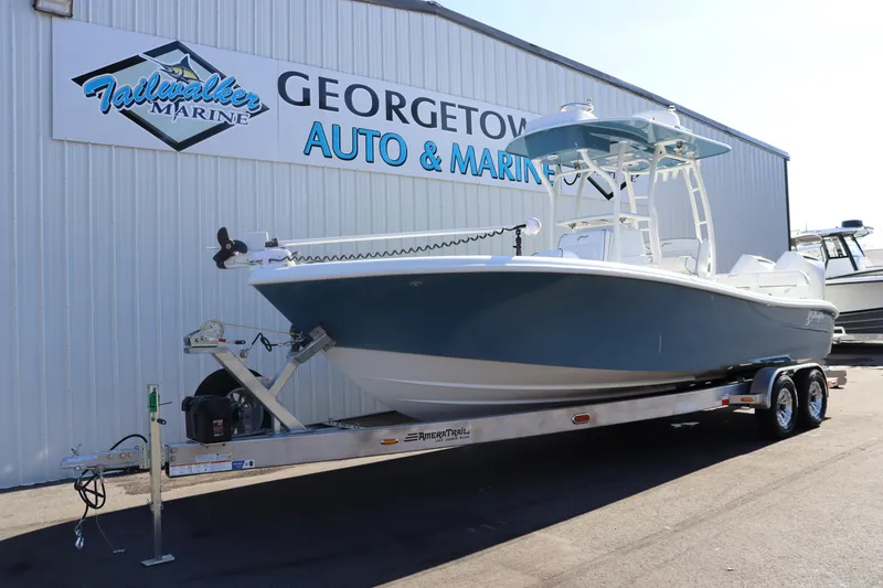 Slide: The Image of 2025 Yellowfin 26 Hybrid boat on trailer at Georgetown Auto & Marine. - 1