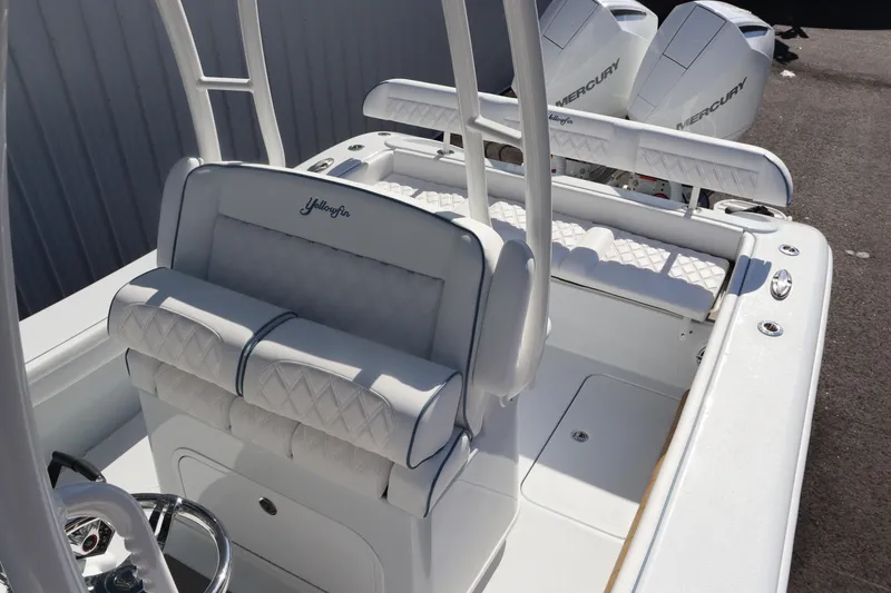 Slide: The Image of 2025 Yellowfin 26 Hybrid boat interior with dual Mercury engines. - 10