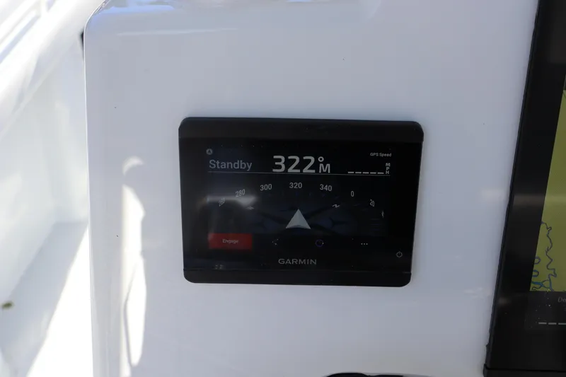 Slide: The Image of Garmin navigation display on 2025 Yellowfin 26 Hybrid boat dashboard. - 17