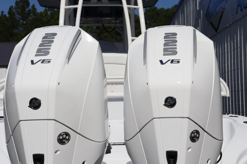 Slide: The Image of 2025 Yellowfin 26 Hybrid boat with dual V6 engines, rear view. - 5