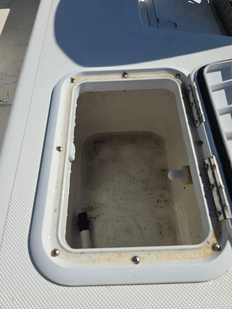 Slide: The Image of Open storage compartment on 2007 Sundance B18CC boat. - 12