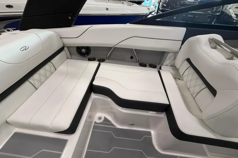 Slide: The Image of 2025 Regal LS2 Surf boat interior with luxurious white seating and modern design. - 28