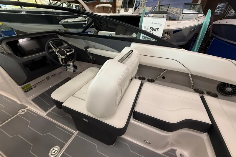 Slide: The Image of Interior of 2025 Regal LS2 Surf boat with modern steering and seating. - 35