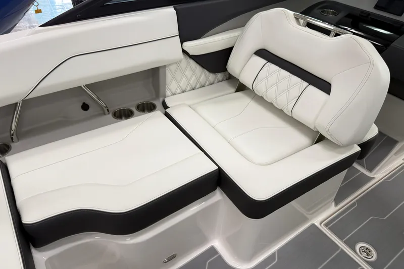 Slide: The Image of Luxurious seating in 2025 Regal LS2 Surf boat with elegant white and black upholstery. - 37