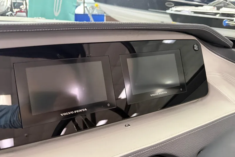 Slide: The Image of Dashboard of 2025 Regal LS2 Surf boat with dual Volvo Penta displays. - 40