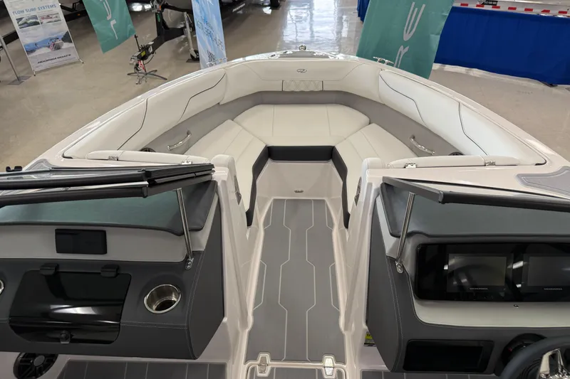 Slide: The Image of 2025 Regal LS2 Surf boat interior with sleek seating and modern dashboard design. - 48