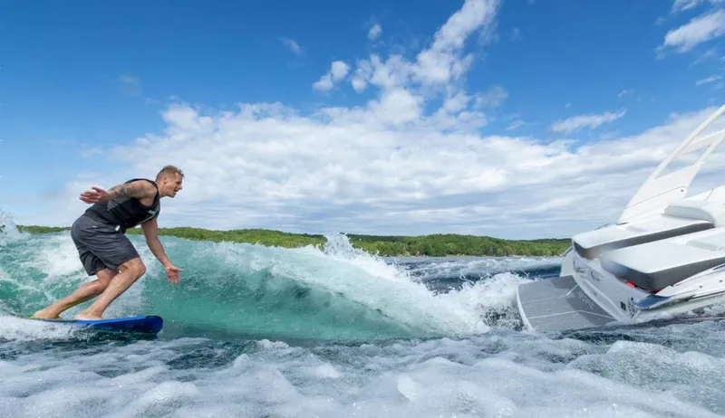 Slide: The Image of 2025 Regal LS2 Surf boat trailer with hydraulic lift and diamond plate step. - 5