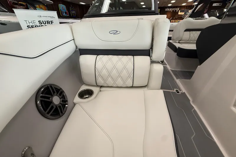 Slide: The Image of 2025 Regal LS2 Surf boat interior with luxurious seating and speaker system. - 57