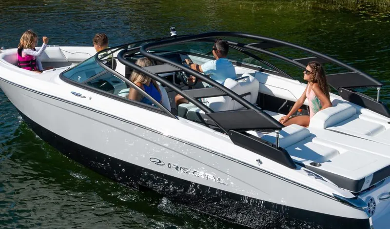 Slide: The Image of 2025 Regal LS2 Surf boat's Volvo Penta outdrive and propeller detail. - 6