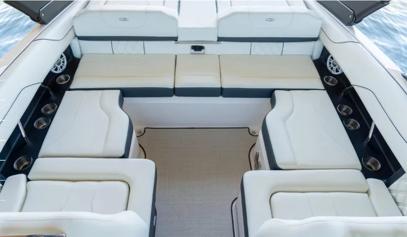 Slide: The Image of 2025 Regal LS2 Surf boat's rear view showcasing sleek metallic components. - 7