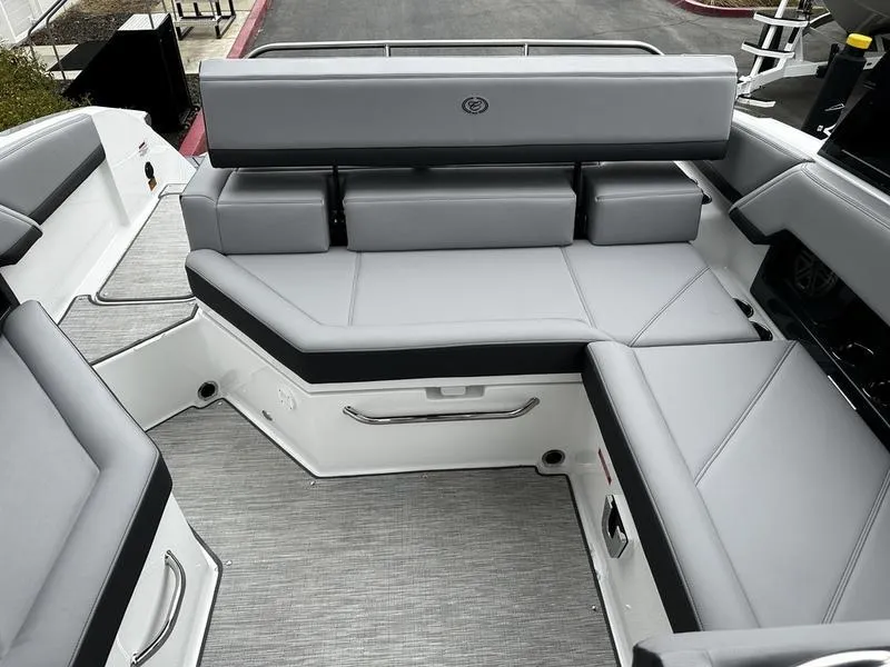 Slide: The Image of Luxurious seating area on 2025 Cobalt R4 boat with sleek gray upholstery. - 5
