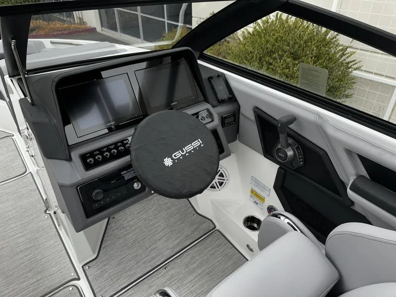 Slide: The Image of 2025 Cobalt R4 boat dashboard with modern controls and dual screens. - 6