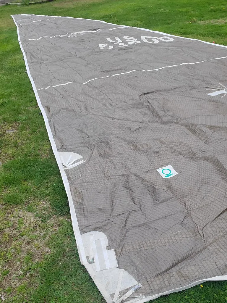 Slide: The Image of Sail from 1991 Concordia Taylor 42 yacht laid out on grass. - 25