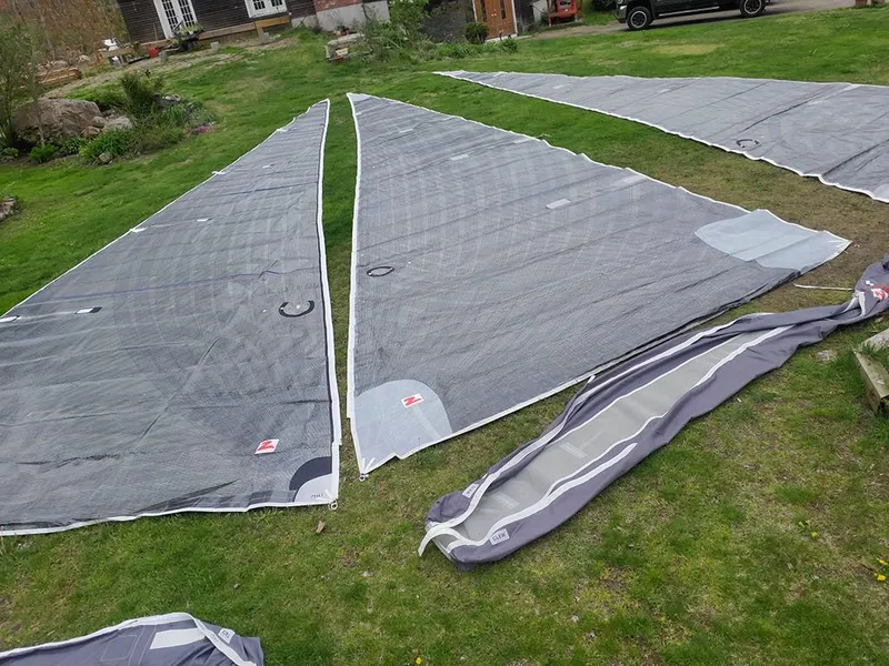 Slide: The Image of Sailboat sails laid out on grass, Concordia Taylor 42, 1991 model. - 29