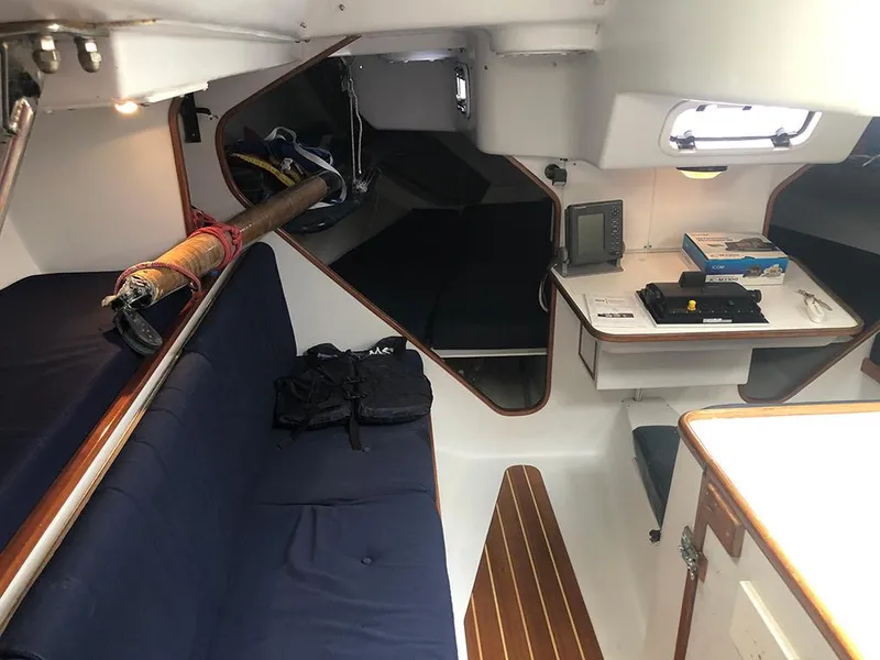 Slide: The Image of Interior of 1991 Concordia Taylor 42 sailboat with seating and navigation equipment. - 9