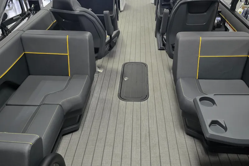 Slide: The Image of 2025 Manitou Explore Navigator interior with sleek gray seating and modern design. - 10