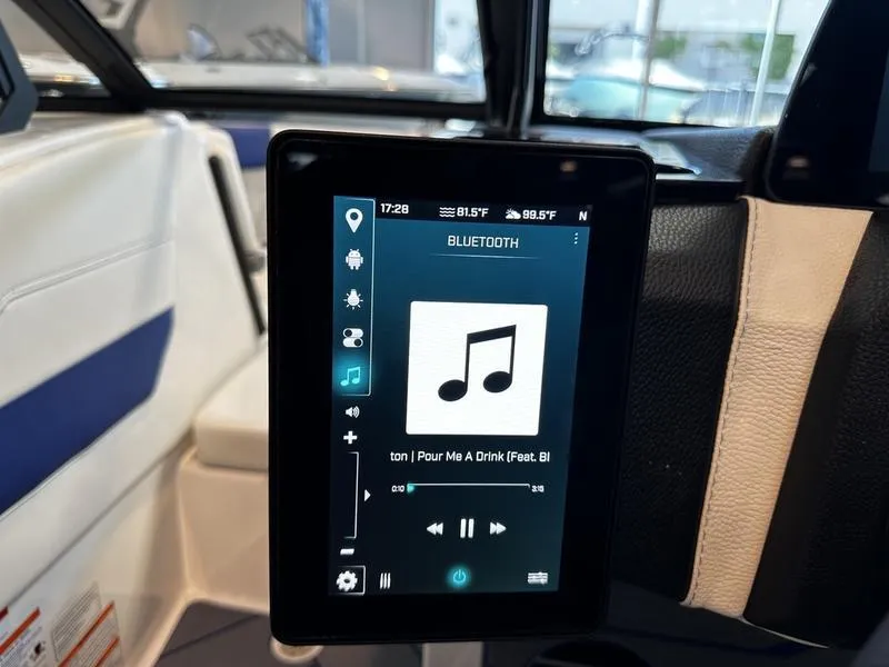 Slide: The Image of 2025 Malibu Wakesetter 23LSV touchscreen displaying Bluetooth music interface. - 14