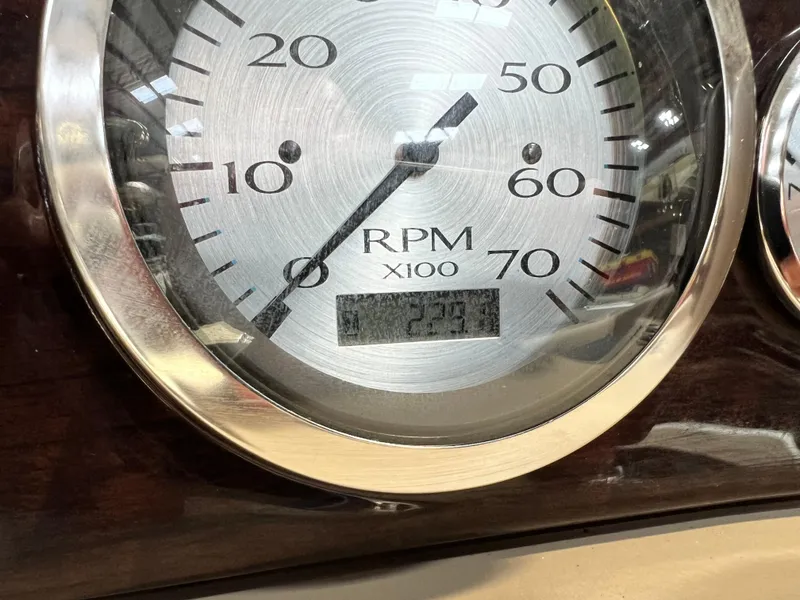 Slide: The Image of Close-up of 2014 Bennington 2250 GSR RPM gauge showing 237 hours. - 11