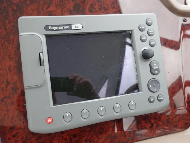 Slide: The Image of Raymarine C80 marine display on 2006 Regal 3560 Commodore dashboard. - 4
