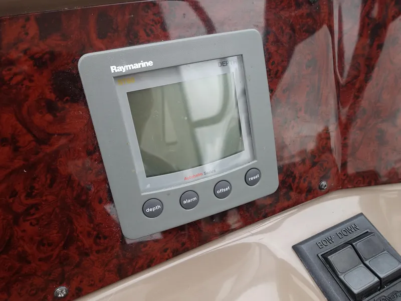 Slide: The Image of Raymarine display on 2006 Regal 3560 Commodore boat dashboard. - 5