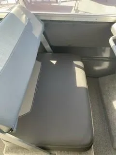 Slide: The Image of 2025 Spartan 2600 Olympia interior seat with gray upholstery and modern design. - 16