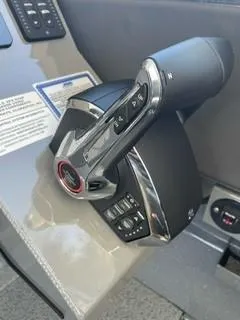 Slide: The Image of Throttle control of 2025 Spartan 2600 Olympia boat, featuring sleek design and advanced controls. - 21