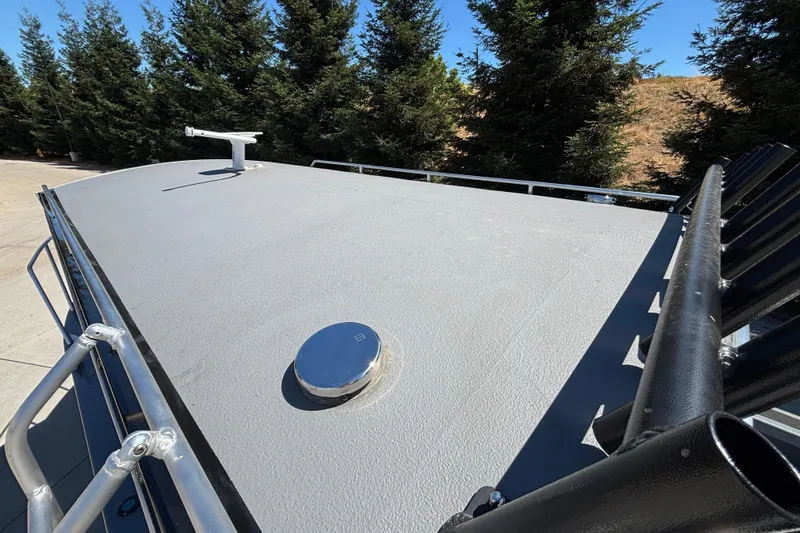 Slide: The Image of Rooftop view of 2025 Spartan 2600 Olympia vehicle, featuring sleek design and sturdy railings. - 40