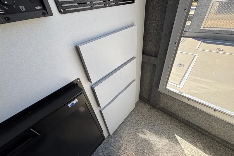 Slide: The Image of Interior of 2025 Spartan 2600 Olympia, featuring sleek panels and modern design elements. - 48
