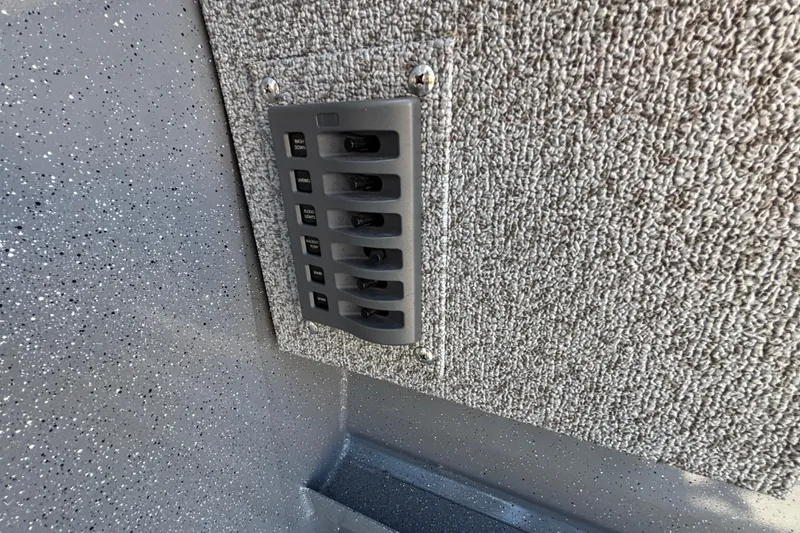 Slide: The Image of Control panel in 2025 Spartan 2600 Olympia RV with textured wall background. - 38