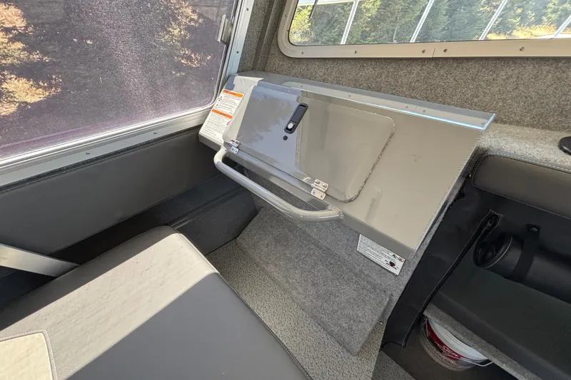 Slide: The Image of Interior of 2025 Spartan 2600 Olympia boat, featuring a sleek, modern design and comfortable seating. - 56