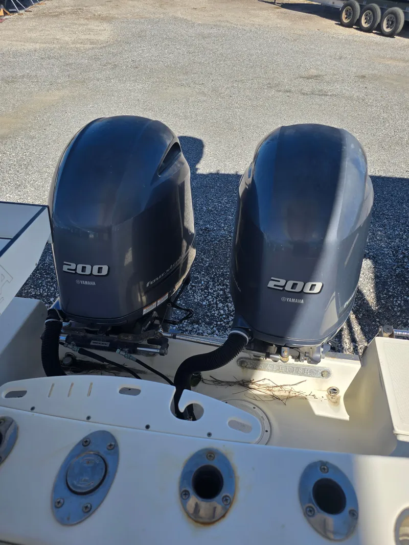 Slide: The Image of Twin Yamaha 200 outboard engines on a 2015 Sailfish 270 WAC boat. - 10