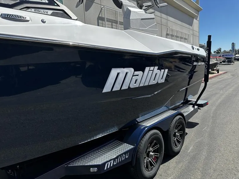 Slide: The Image of 2025 Malibu Wakesetter 25 LSV boat on trailer, side view. - 13