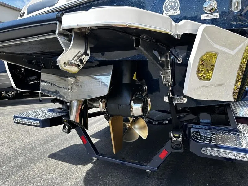 Slide: The Image of 2025 Malibu Wakesetter 25 LSV boat propeller and rear view details. - 15