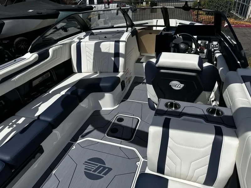 Slide: The Image of 2025 Malibu Wakesetter 25 LSV interior with sleek seating and modern design. - 29