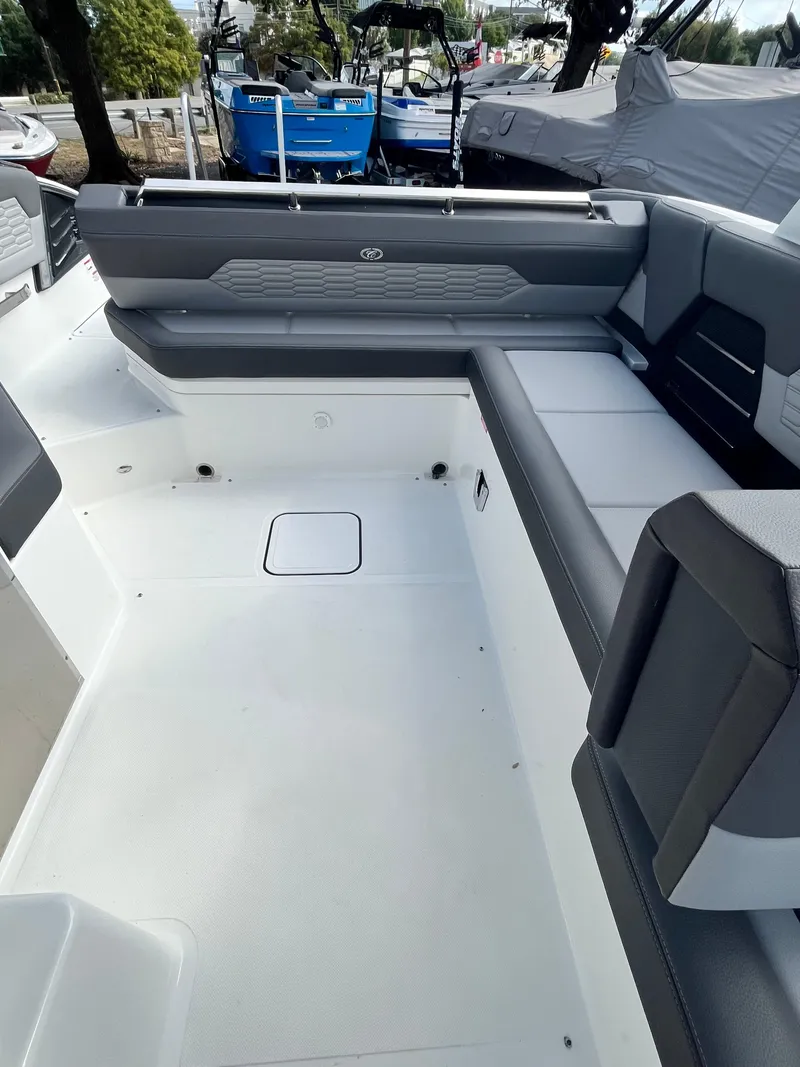 Slide: The Image of 2022 Cobalt A29 boat interior with spacious seating and modern design. - 12