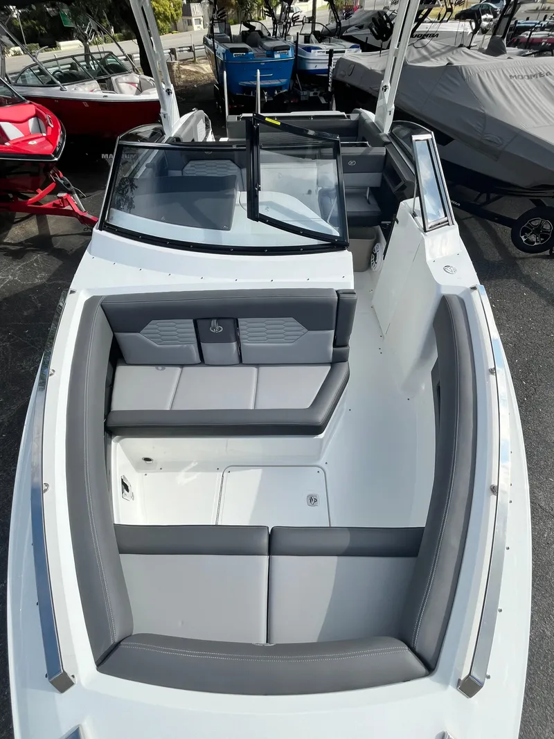 Slide: The Image of 2022 Cobalt A29 boat with sleek seating and modern design. - 25