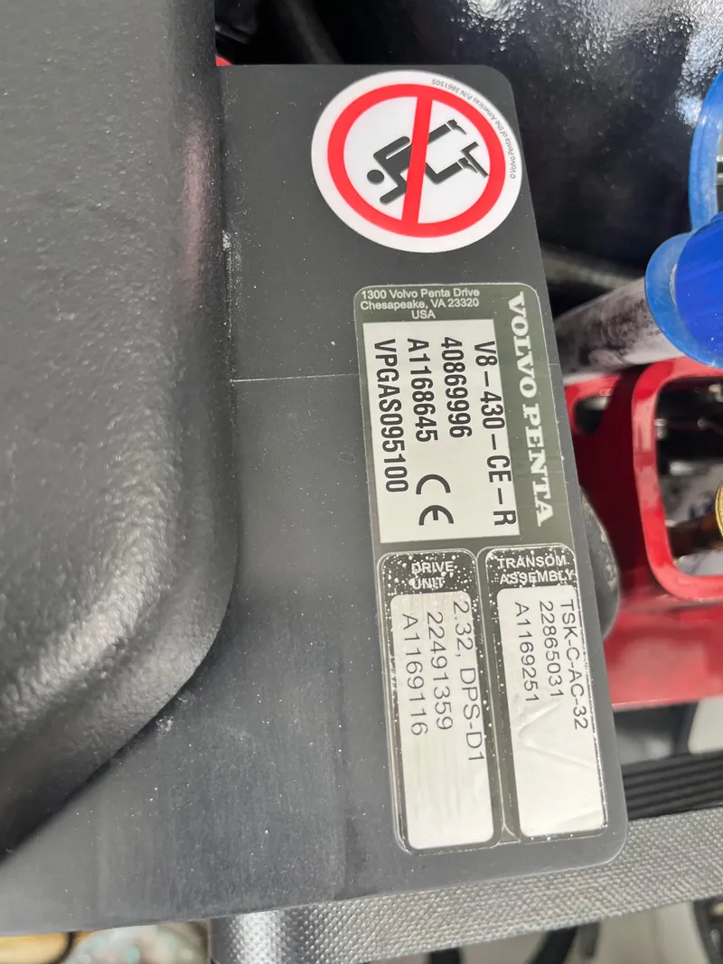 Slide: The Image of Volvo Penta engine label on 2022 Cobalt A29 boat, featuring model and serial numbers. - 38