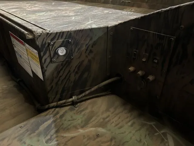 Slide: The Image of Camouflage interior of 2025 G3 18DK boat with Yamaha 70 engine. - 10