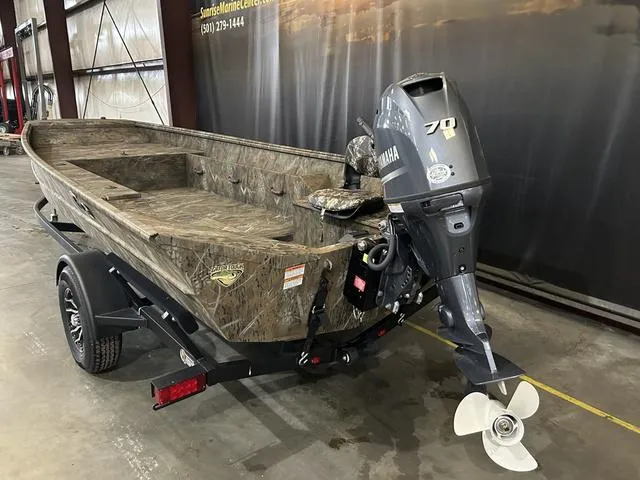 Slide: The Image of 2025 G3 18DK boat with Yamaha 70 engine in showroom. - 5