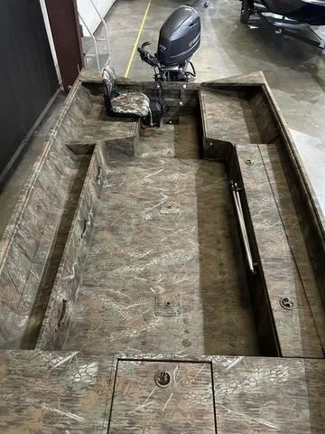 Slide: The Image of 2025 G3 18DK boat with Yamaha 70 engine, camo interior design. - 8