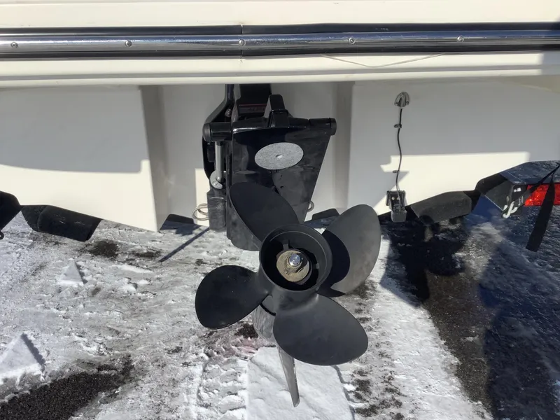 Slide: The Image of Bayliner VR6 2016 boat propeller on snowy ground, rear view. - 9