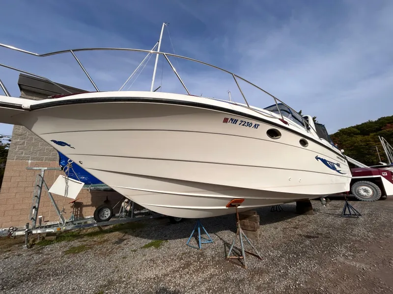 Slide: The Image of 1992 Chaparral Signature 30 boat on stands, side view, outdoors. - 14